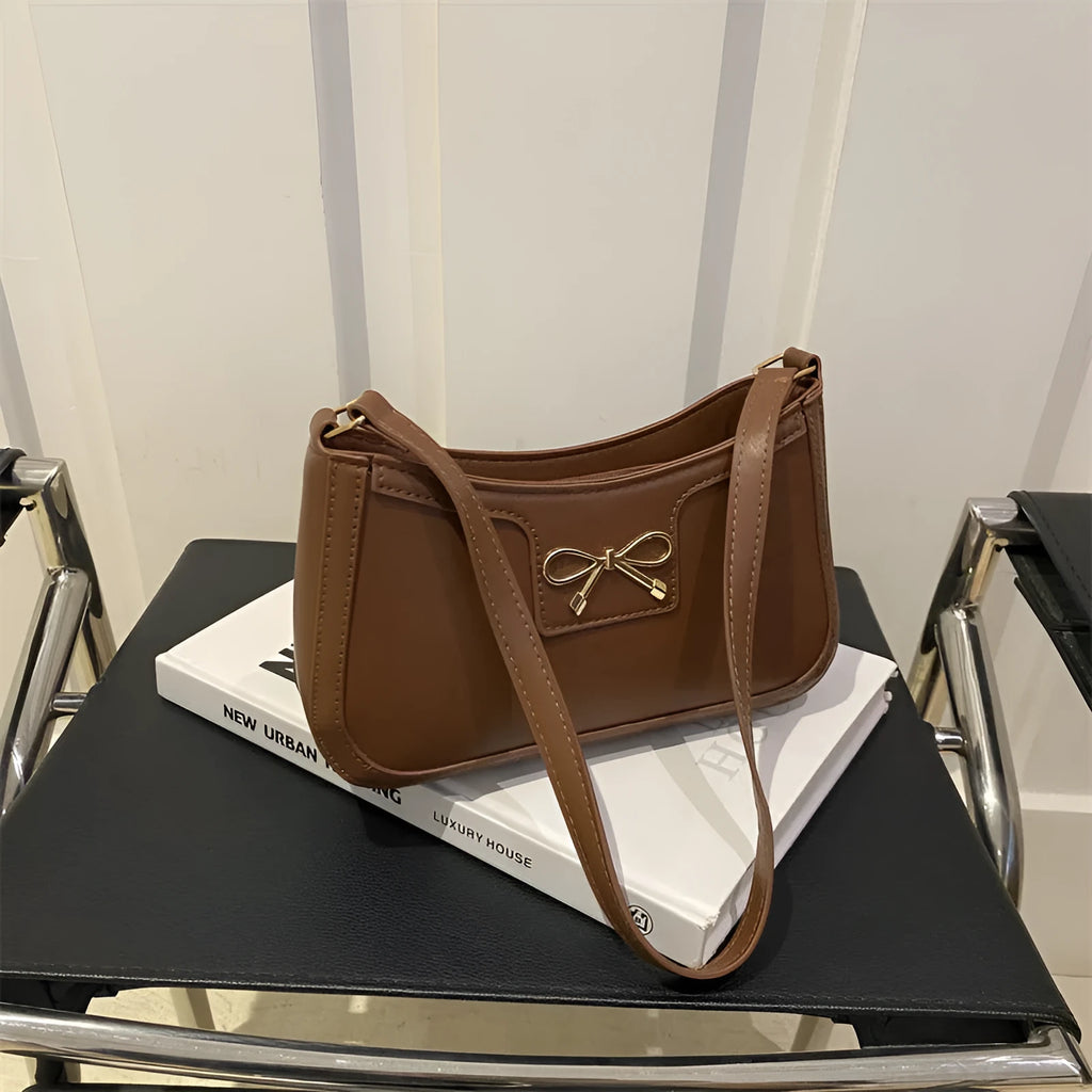 PU leather western style baguette shoulder bag with bow detail in horizontal square silhouette