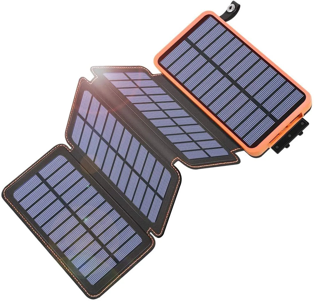 Black solar power bank with solar panel on front, LED light, and soft leather exterior.