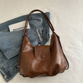 Women's PU leather shoulder bag in horizontal square shape with single strap and mobile phone compartment