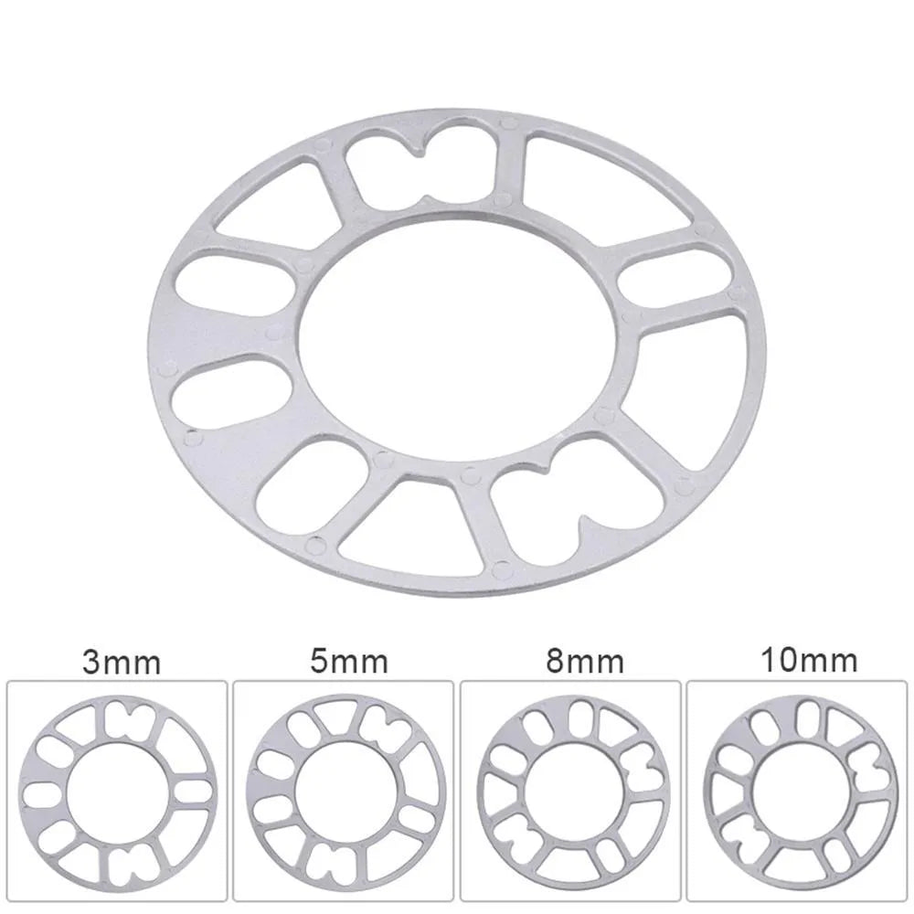 Automotive wheel hub widening spacer ET gasket in various thicknesses for brake caliper clearance.