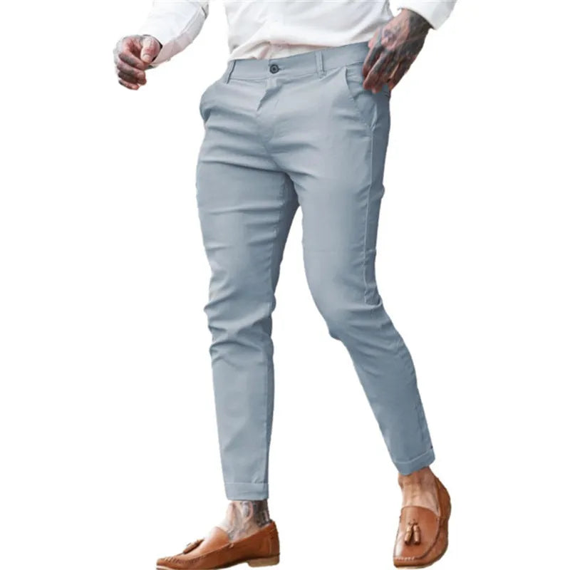 Men's slim fit pencil pants in cotton stretch fabric showing mid waist design and zipper fly closure