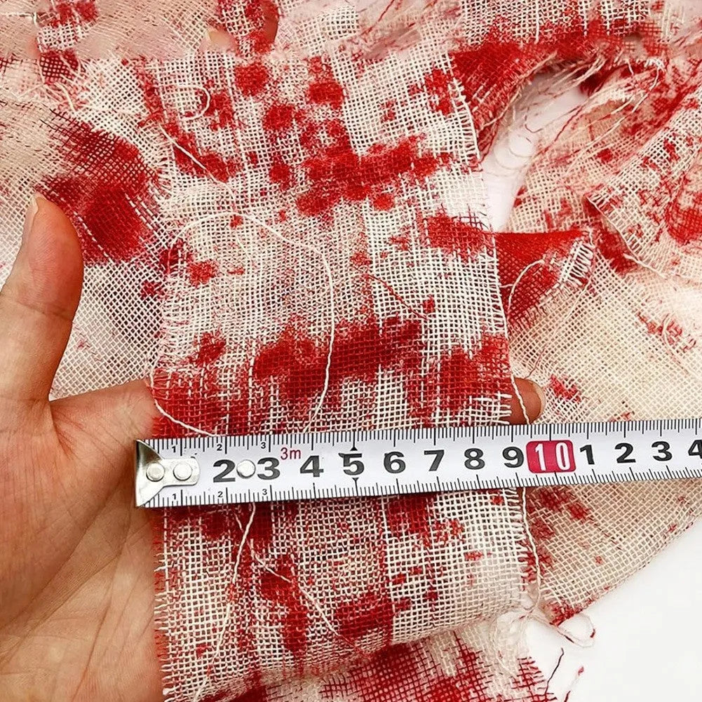 Red and white polyester Halloween horror bandage showing 8cm width and rolled length