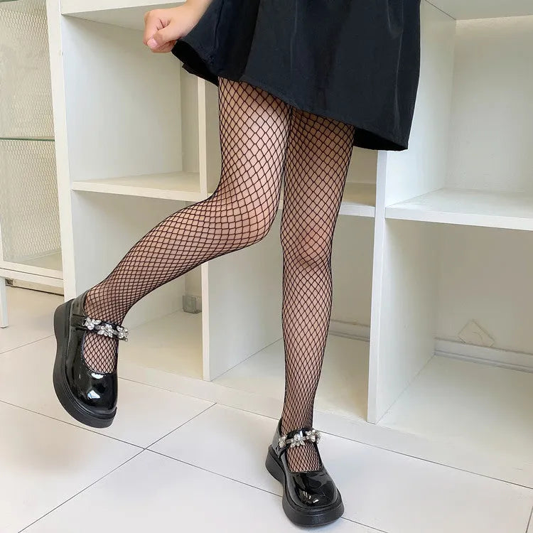 Women's summer stockings showing large, medium, and small mesh patterns in black and white colours.