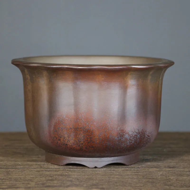 Purple sand ceramic flower pot with antique carved wood burning decoration
