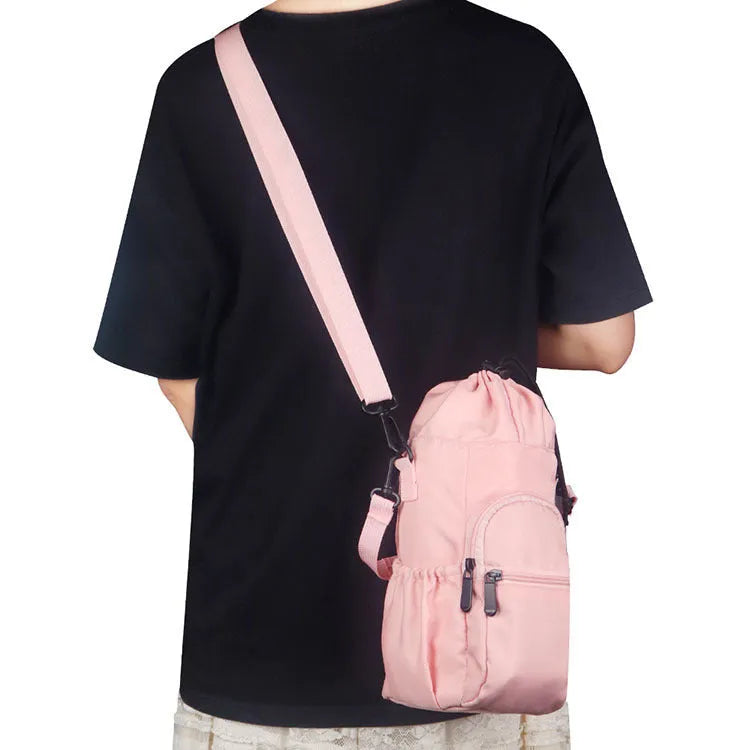 Cloth canvas water bottle pouch with a removable crossbody strap in black, green, and pink colour options.