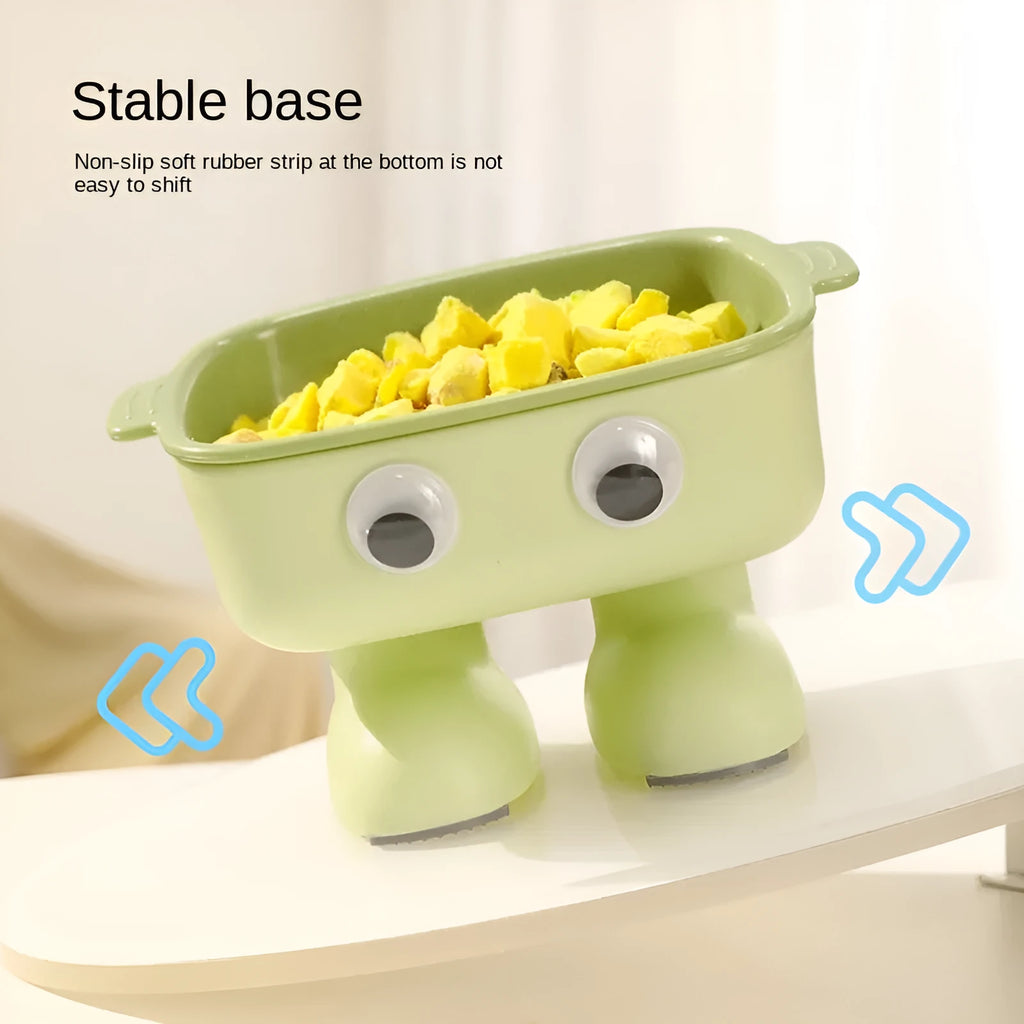 Green robot-shaped elevated cat bowl with tilted design and non-slip base