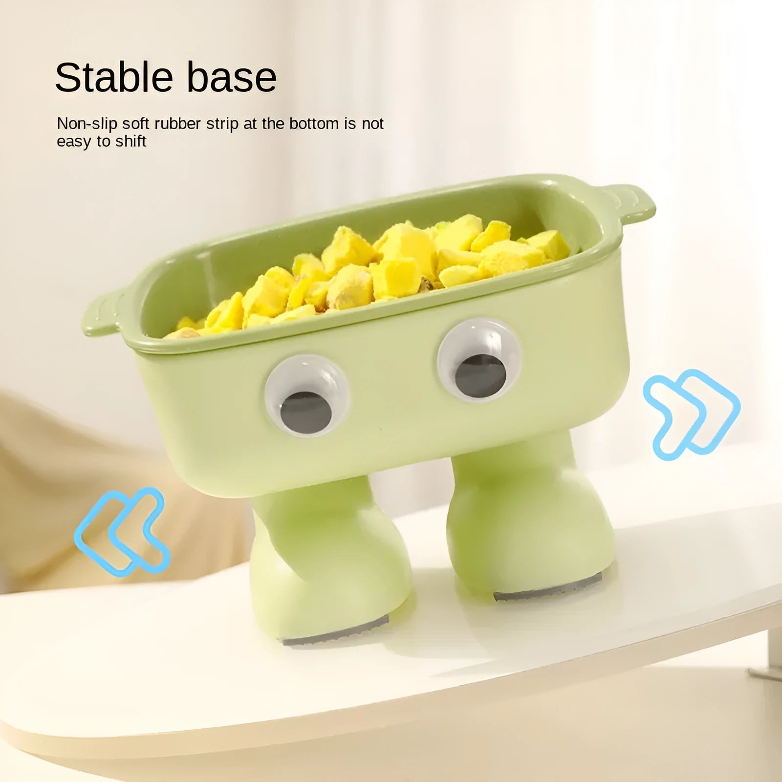 Green robot-shaped elevated cat bowl with tilted design and non-slip base