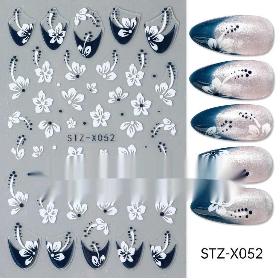 Cartoon love pattern nail art sticker decals in black and silver colours on a plastic sheet.