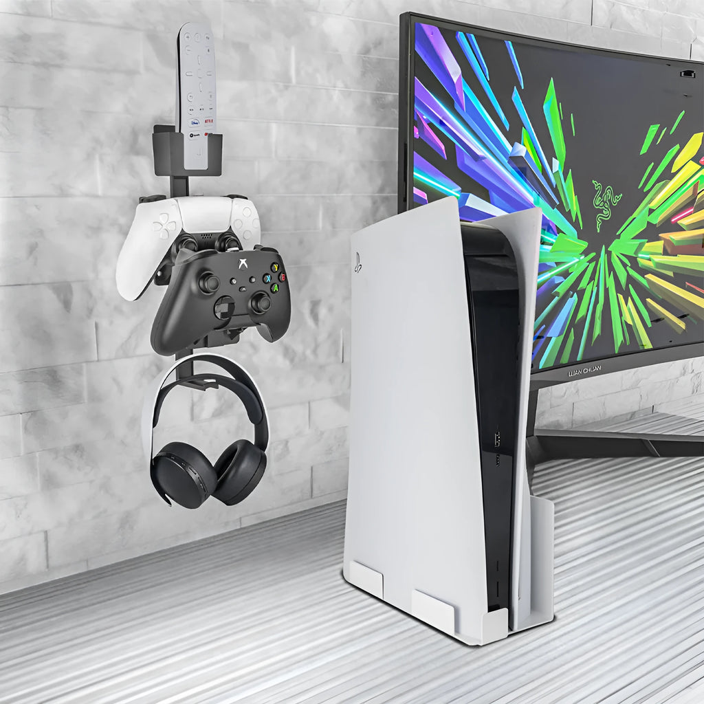 White wall-mounted hook holding a game controller with black console compatibility labels