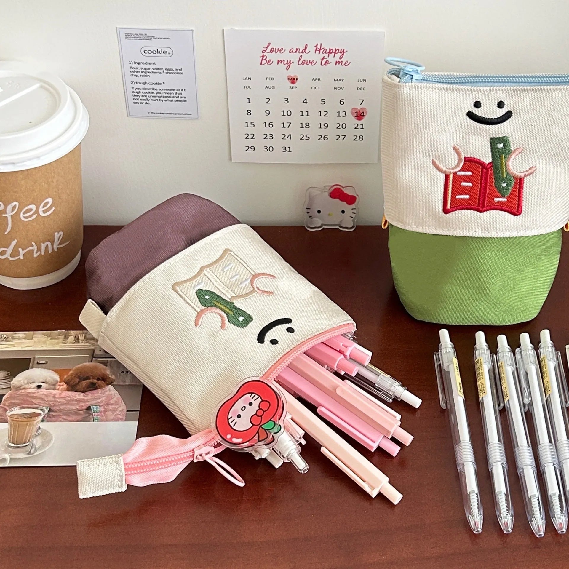 Korean style cartoon collapsible pencil case made from Oxford fabric in brown colour, shown with pens inside.
