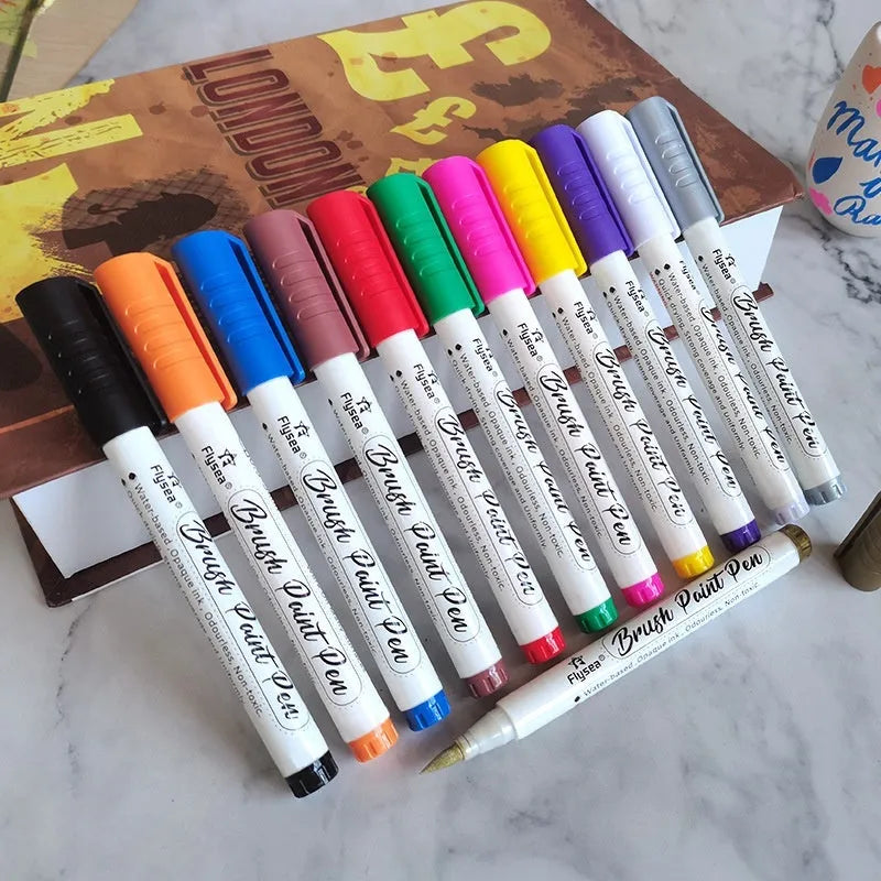 Set of soft tip gouache pens in a case, showing multiple vibrant acrylic marker colours.