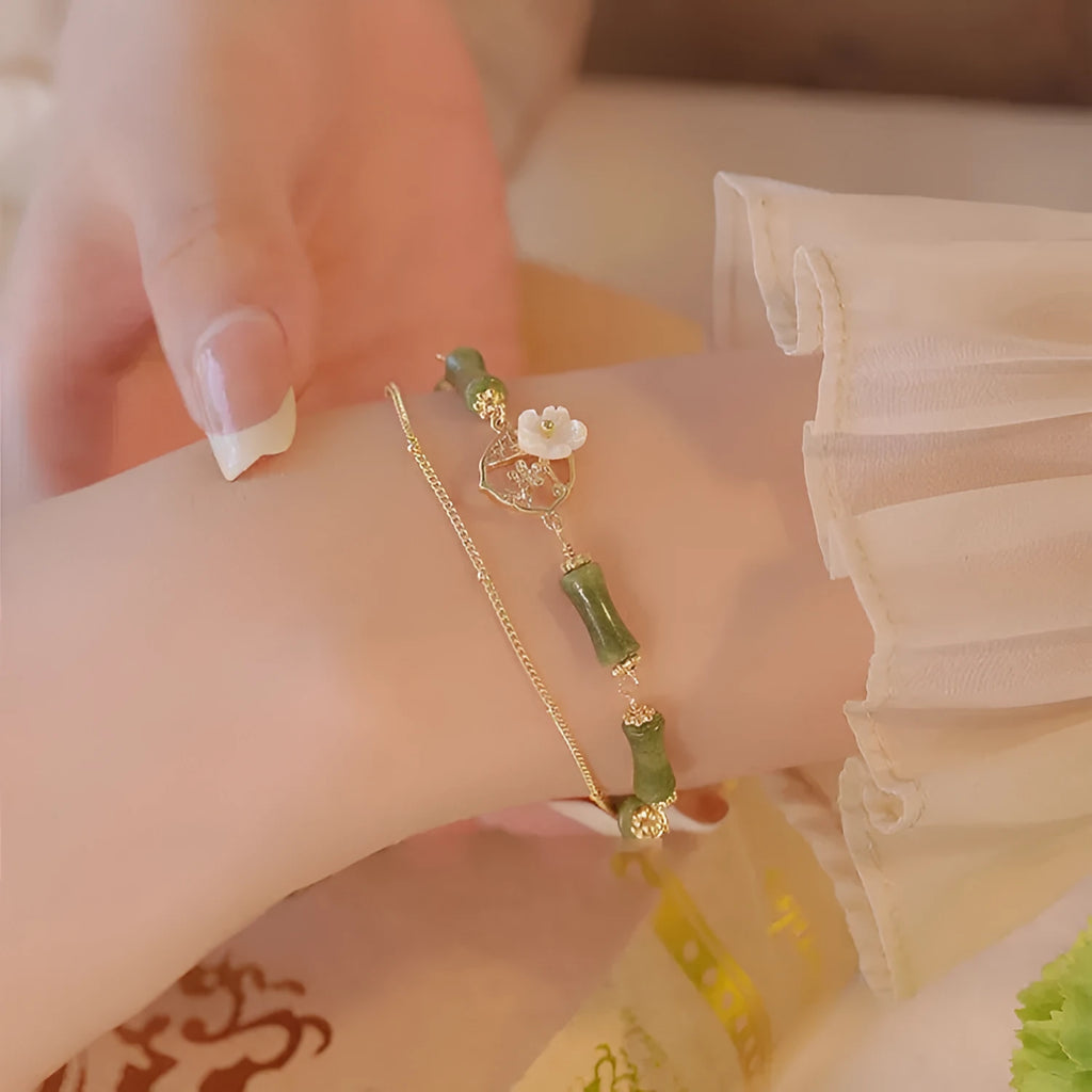 Handmade natural olivine bracelet with double layer twin bells design and olive branch pastoral details