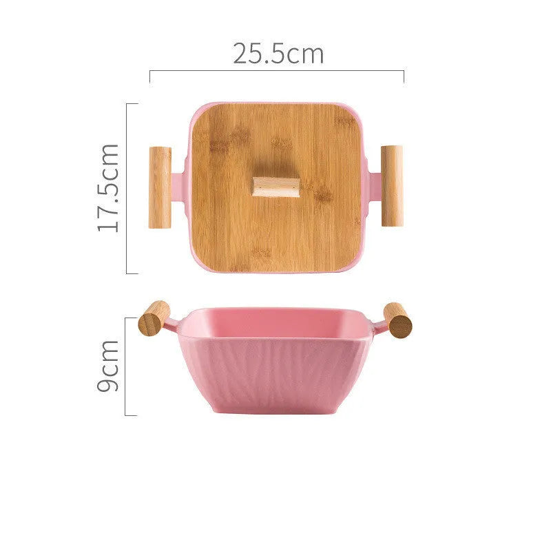 Modern ceramic bowl with irregular organic shape and coordinating lid in porcelain