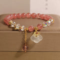 Women's adjustable strawberry quartz crystal bracelet with white agate stones and auspicious cloud charm