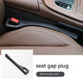 Polyurethane car seat gap filler strip in black, shown next to a vehicle centre console.