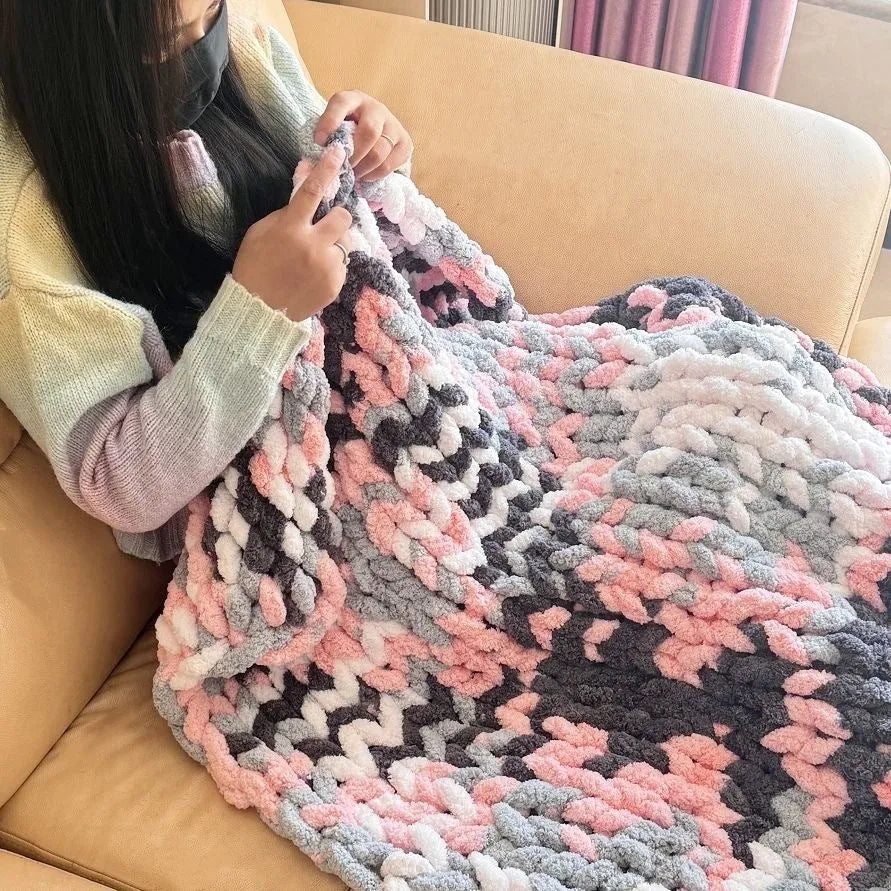 Coarse yarn chenille knitted blanket with braided gravity edge in modern simplicity style
