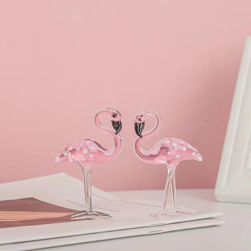 Pink and white crystal decorative flamingo table prop on a modern shelf