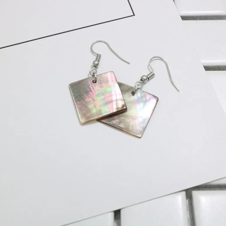 Women's geometric shell earrings in Square Panther and Rectangular Shell colours with retro natural styling