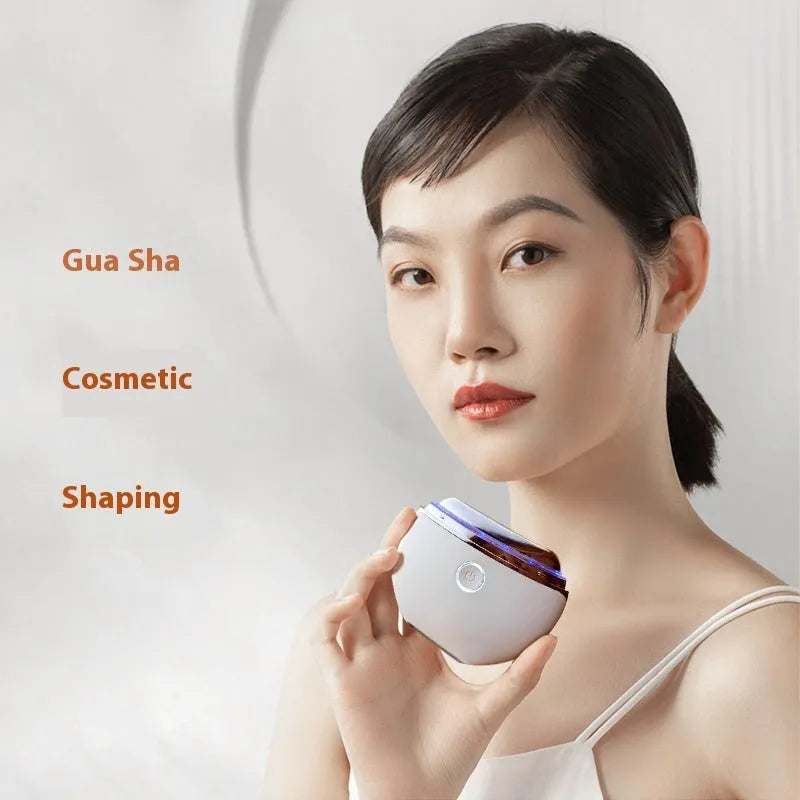 French pattern household electric scraping and IPL beauty device with colour light display.