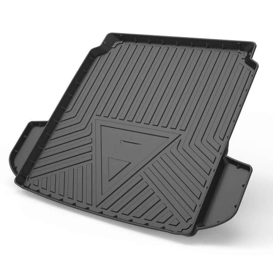 Black TPE car boot liner with a carbon fibre pattern texture, laid flat.