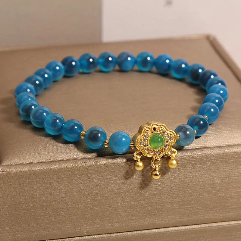 Women's blue sugar heart agate crystal pendant bracelet with safety lock clasp and rhinestone decorative elements