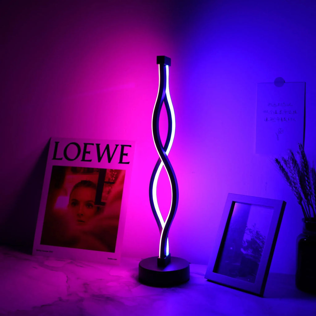 Black aluminium desk lamp with touch dimming controls and three colour temperature buttons