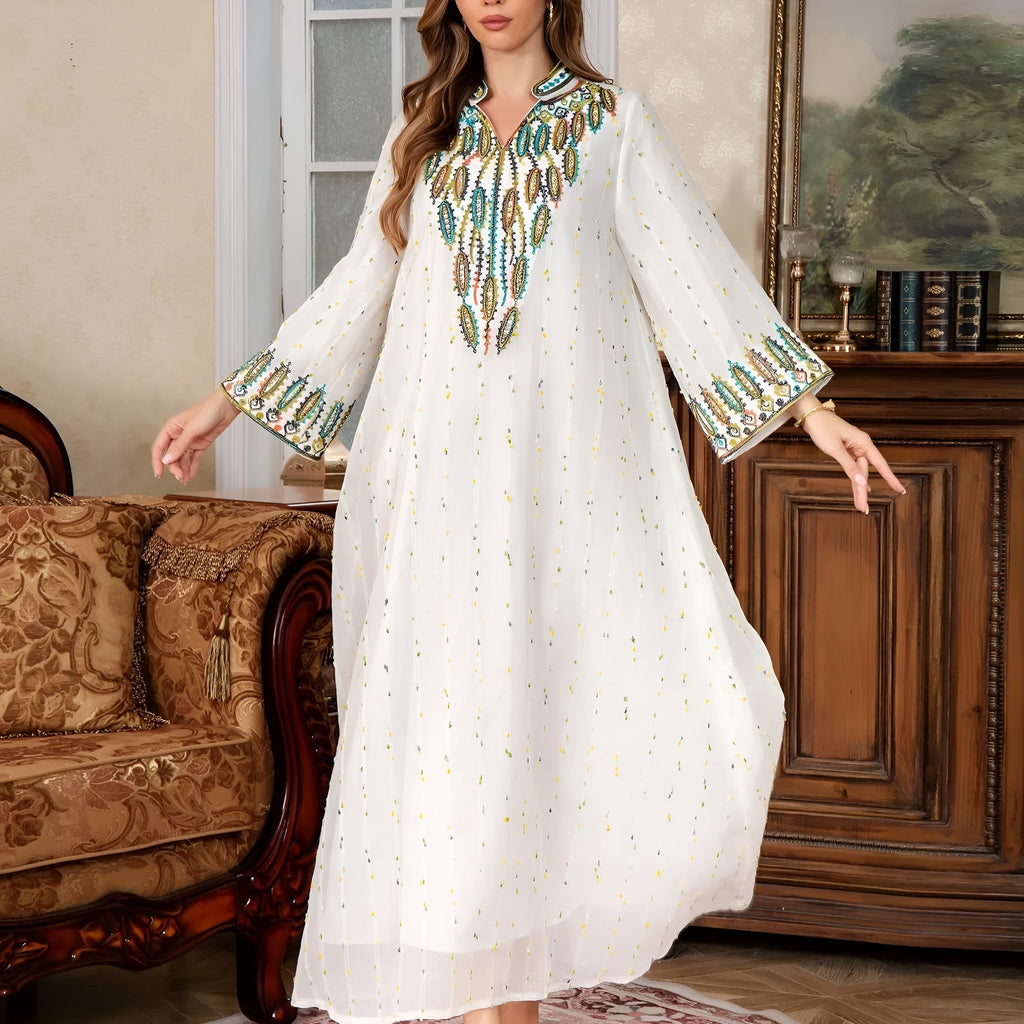 White full-length Arabic robe for women with long sleeves, made from polyester fabric.