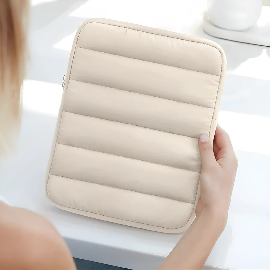 Elastic puff bag laptop sleeve for 9.7-11 inch devices in black, khaki, and silver colours