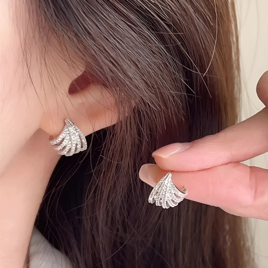 Geometric line design earrings with zircon stones and platinum electroplated finish