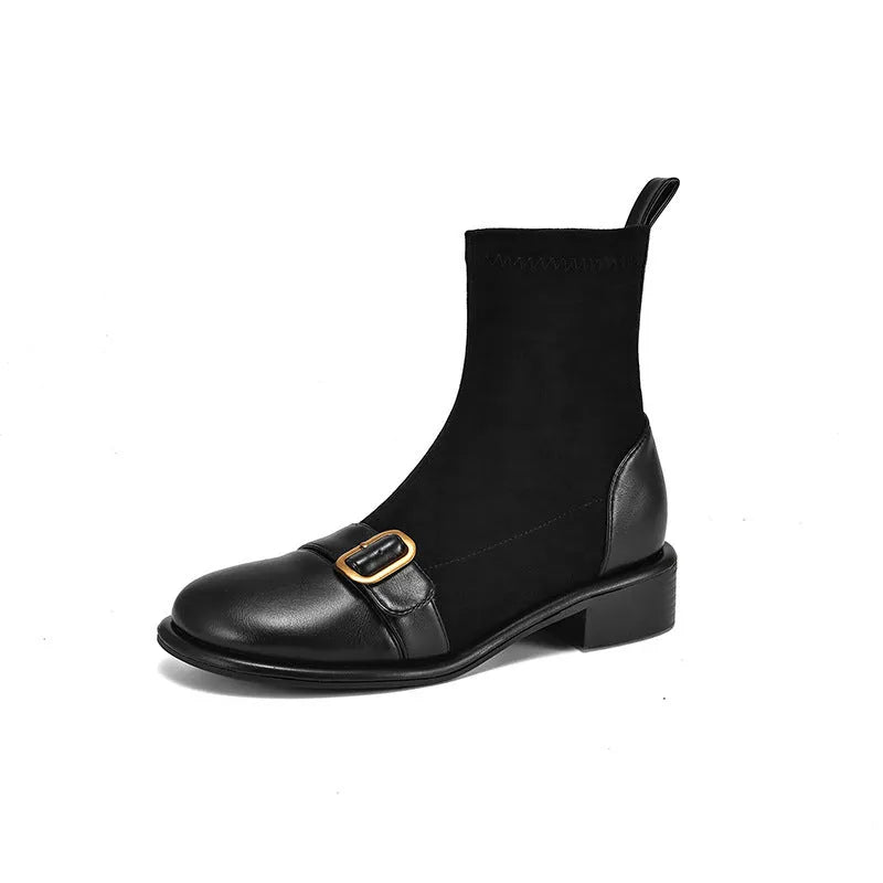 Black women's low heel Martin boots with front lace-up and buckle detail stitching.