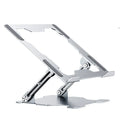 Grey aluminium adjustable laptop stand folded and unfolded on a wooden desk