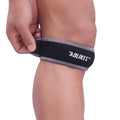 Black and grey patella retinaculum knee support for adult sports use.