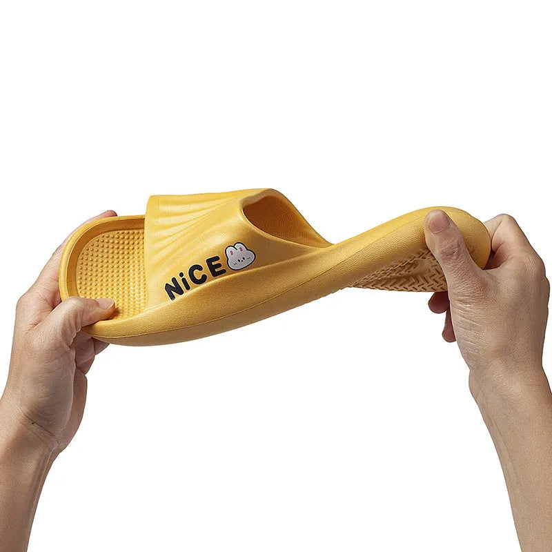 Pair of adult EVA flip flop slippers with a cartoon pattern on a non-slip sole, shown in one of six available colours.