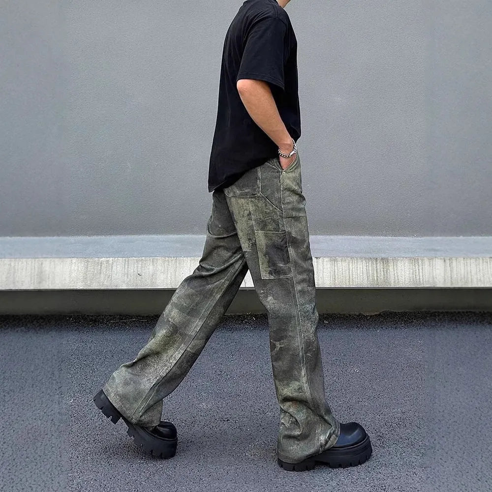 Men's straight-leg jeans with a digital camouflage print on blue denim fabric.