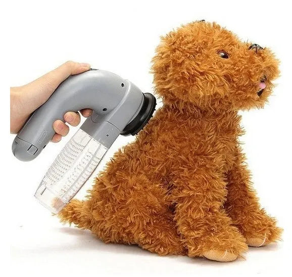 Grey portable electric pet hair vacuum cleaner with soft rubber grooming head