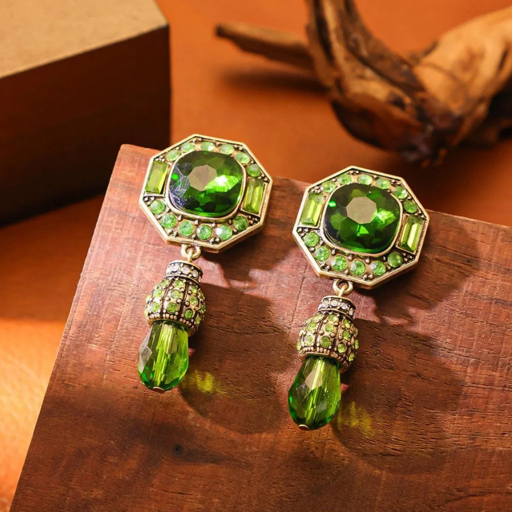Full-jeweled geometric octagonal stud earrings in blue or green copper alloy for female wearers