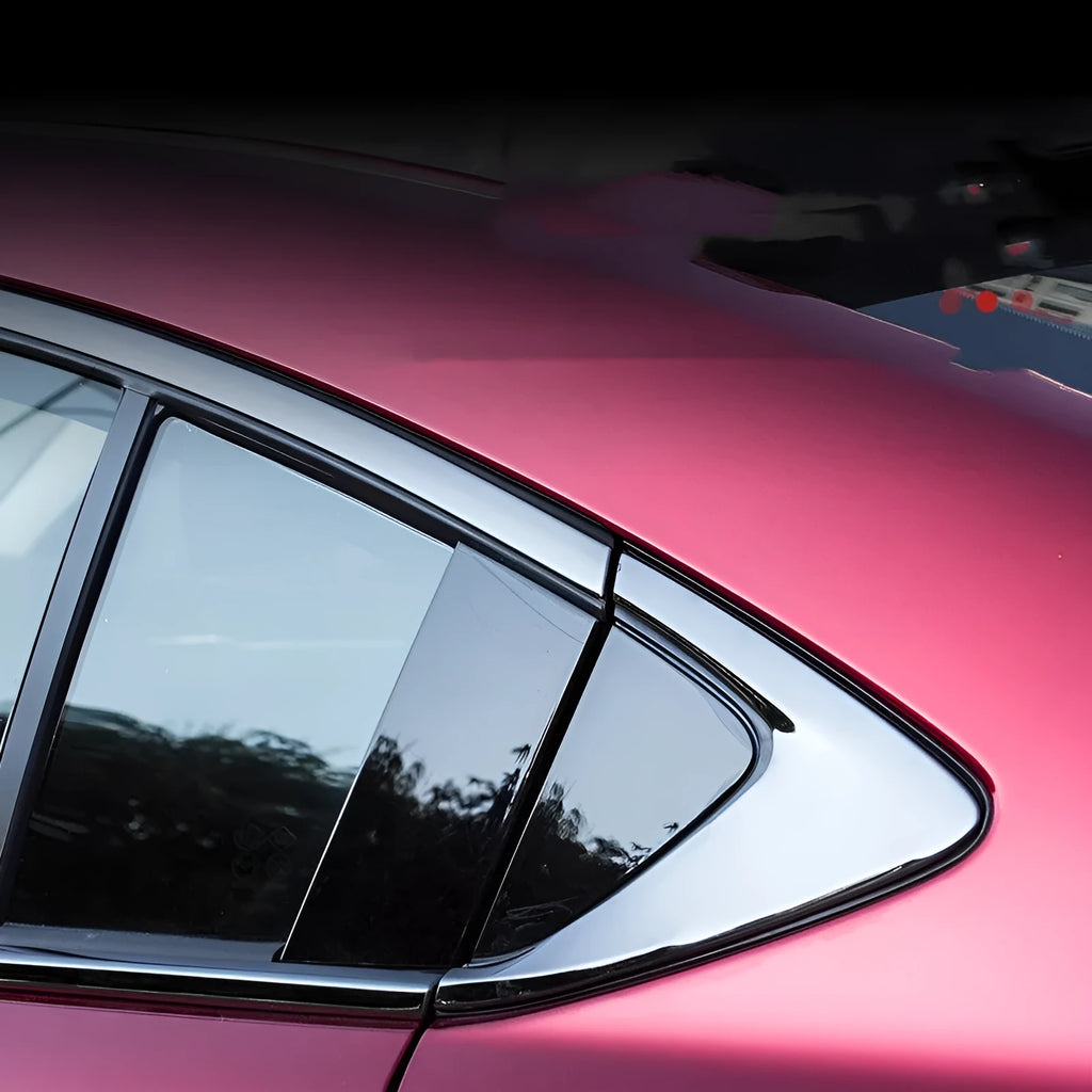 Stainless steel black titanium window trim strip kit with straight and corner pieces.