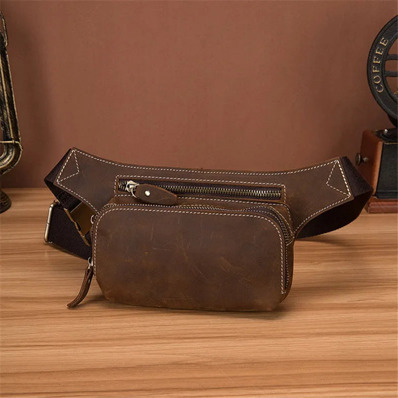Brown cowhide leather men's sports waist bag showing pull closure and dimensions
