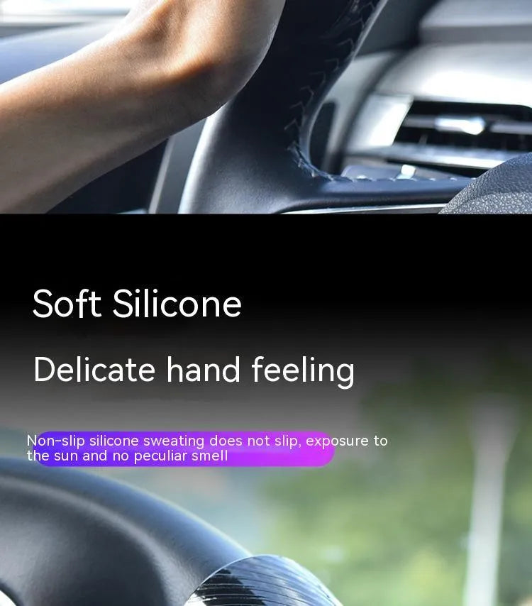 Steering wheel assist ball with silicone grip and metal bearing for single hand steering assistance
