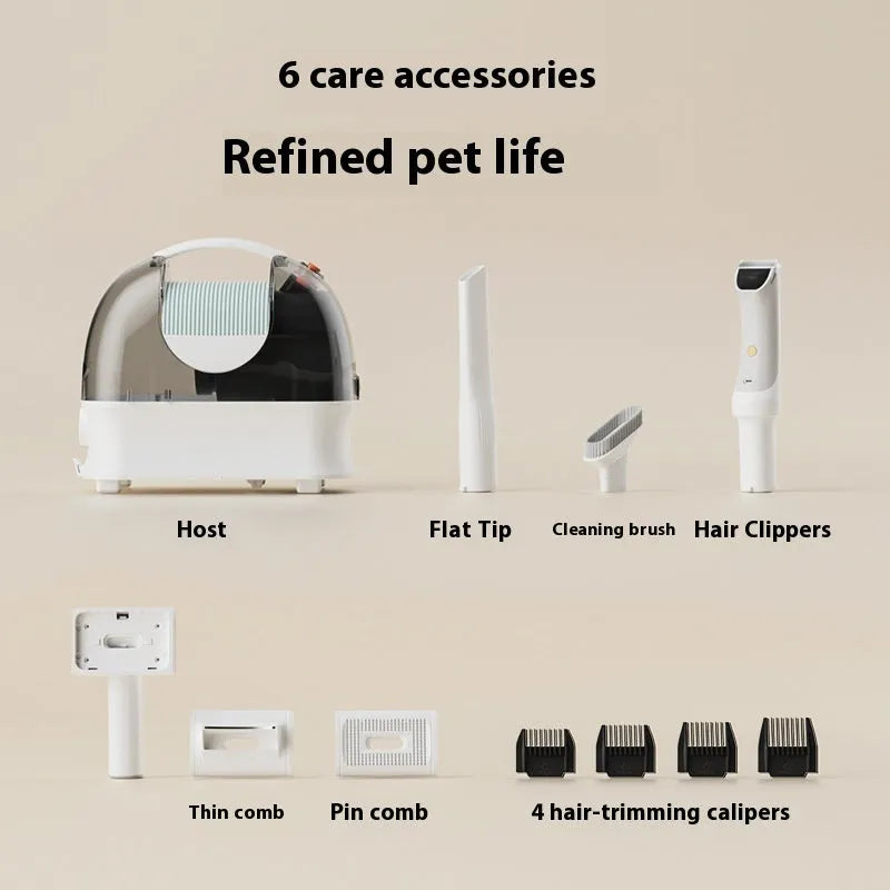 Pink and white pet grooming vacuum cleaner with electric clipper and multiple grooming attachments