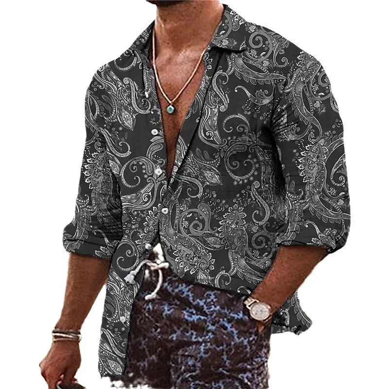 Man wearing a loose-fit bohemian-style shirt with a vibrant 3D floral print and long sleeves.