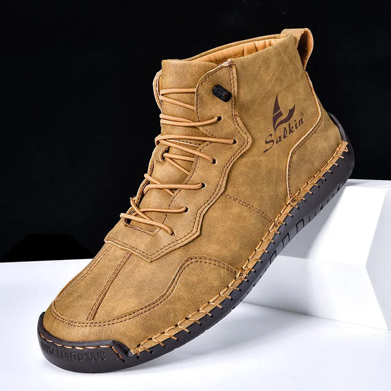 Retro high-top boots with frosted finish, round toe, and elastic band entry