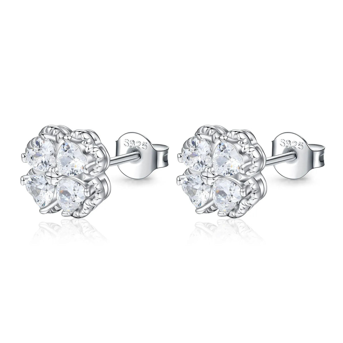 Close-up of women's heart-shaped 925 silver earrings with four-leaf clover zircon inlay, white gold colour finish.