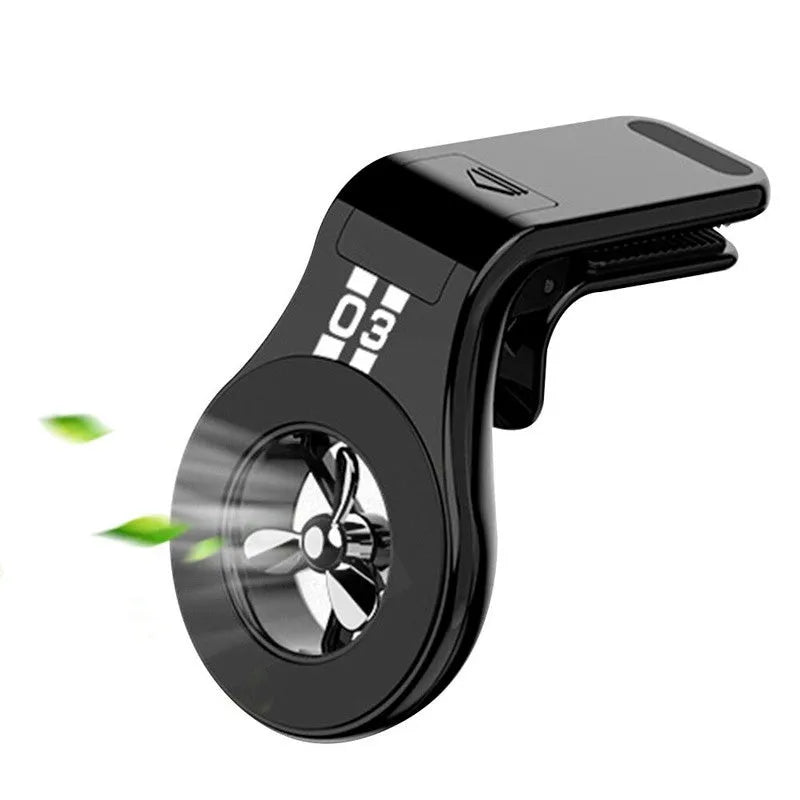 Magnetic car phone holder mounted on vehicle air vent with smartphone attached showing adjustable rotation mechanism