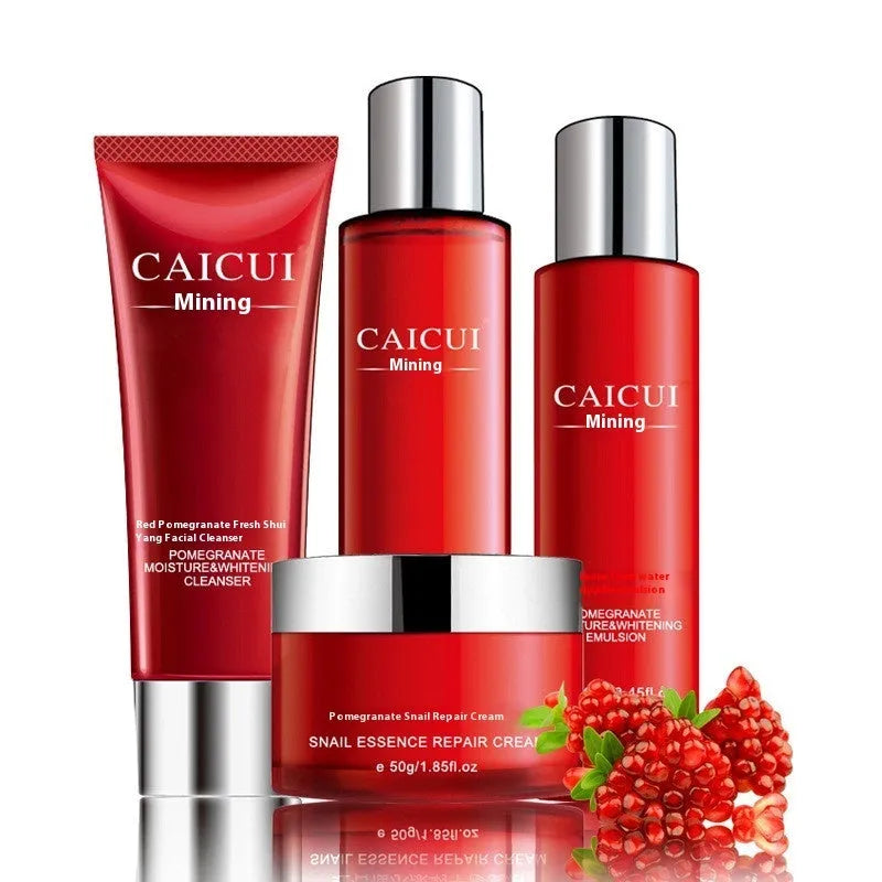 Pomegranate skin care set with four red packaged products: face wash, toner, lotion, and facial cream
