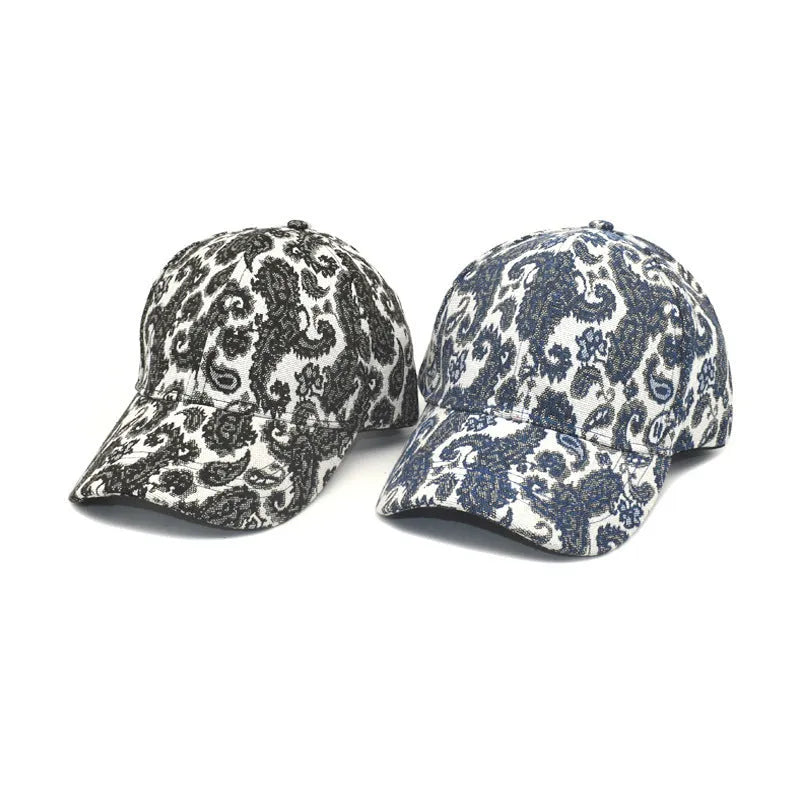 Unisex baseball cap with printed paisley pattern in blue colour option showing dome crown design