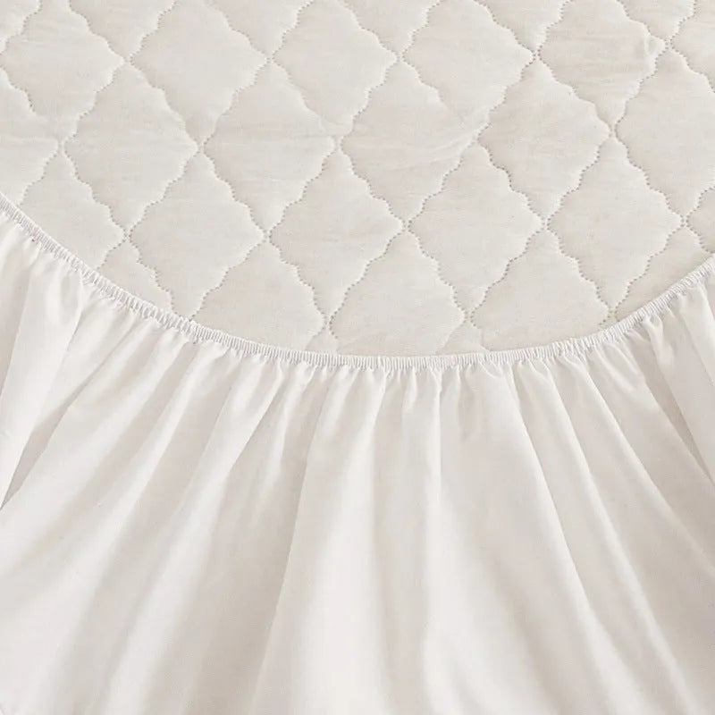Diamond lattice quilted waterproof mattress protector in bamboo fibre, shown in a solid colour.