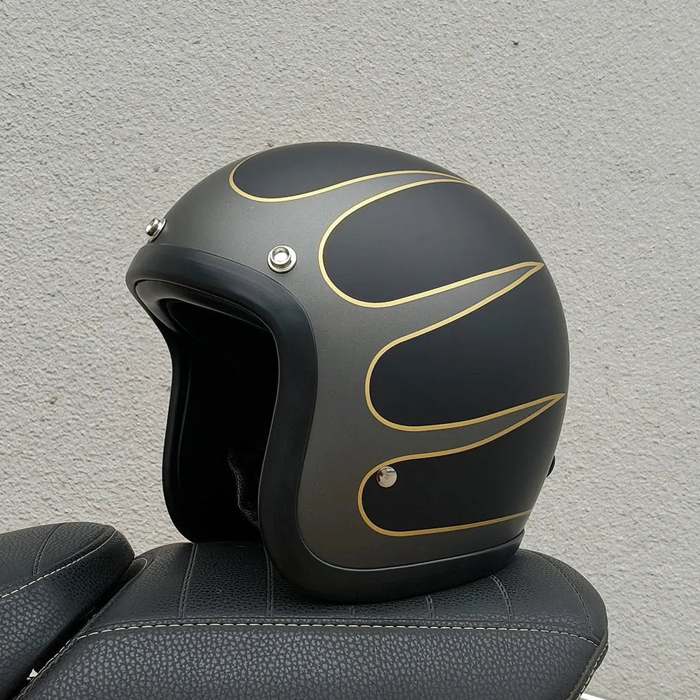 Retro-style half-shell motorcycle helmet in fibreglass, shown in a cement grey colour option.