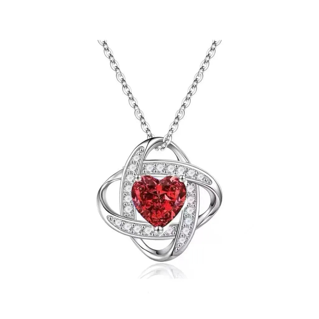 Copper heart necklace with electroplated platinum finish in five colour variations on model