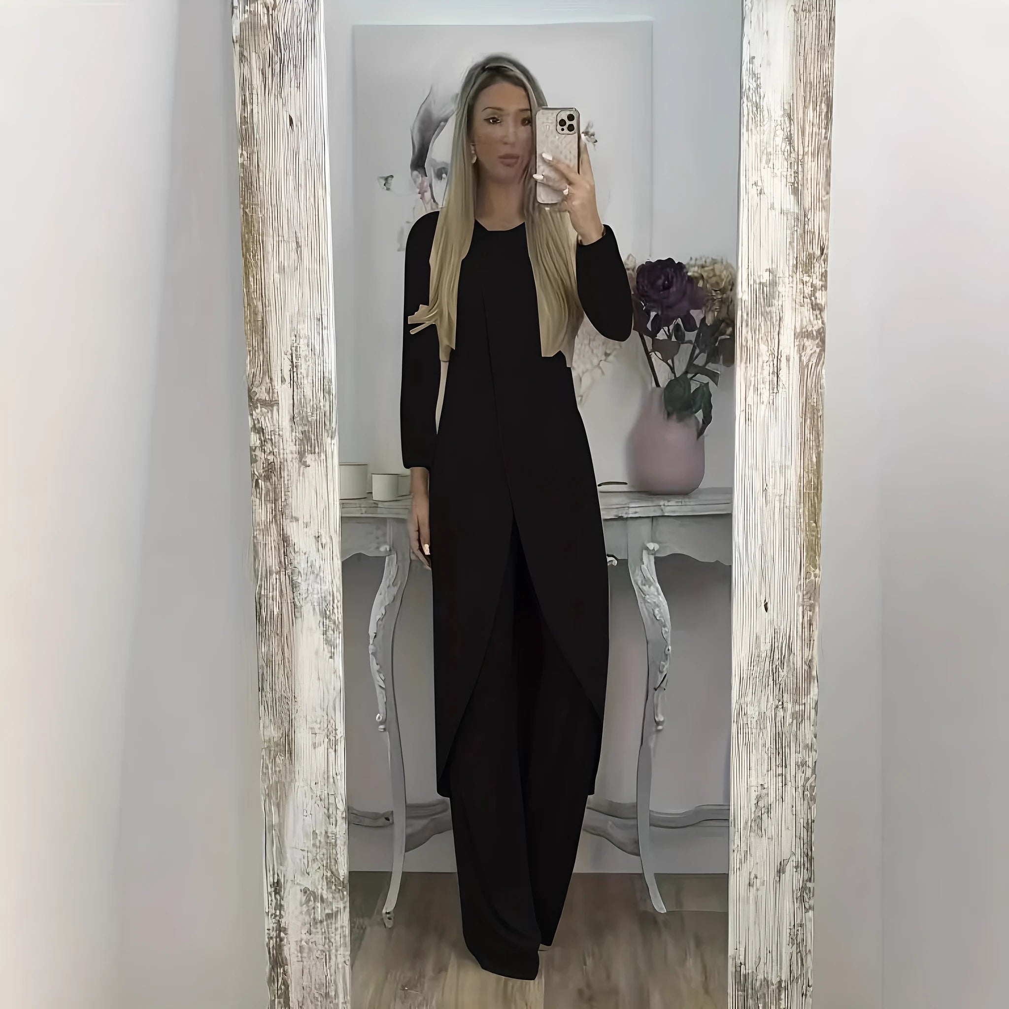 Women's black polyester long sleeve two-piece lounge set with loose fit round neck top and trousers